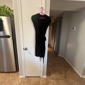 Brand New, never worn Maggy London Small wrap style Little Black Dress